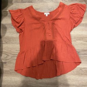 Reddish flowy top
